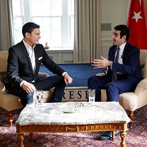 Evan Solomon speaking with Turkish Ambassador to Canada Selcuk Unal in Ottawa November 25, 2015. (Photograph by Blair Gable)