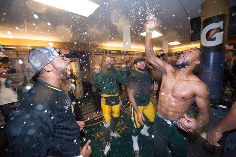 Members of the Edmonton Eskimos celebrate their team's win over the Ottawa Redblacks at the 103rd Grey Cup in Winnipeg, Man. Sunday, Nov. 29, 2015. (Nathan Denette/CP)
