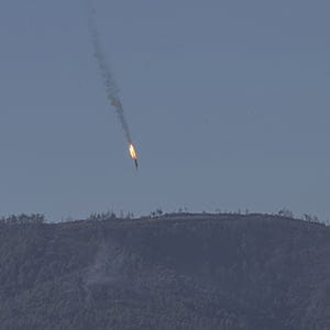 HATAY, TURKEY - NOVEMBER 24: A Russian warplane goes down in Syria's northwestern Turkmen town of Bayirbucak near Turkeys border on November 24, 2015. (Fatih Akta/Anadolu Agency/Getty Images)