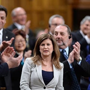 Opposition Leader Rona Ambrose is receives applause during Question Period in the House of Commons in Ottawa, on Monday, Dec. 7, 2015. (Sean Kilpatrick/CP)