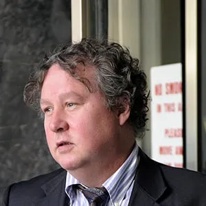 Disgraced immigration judge, Steve Ellis, leaves the courthouse at 361 University after he was handed a guilty verdict by the Supreme Court. Ellis suggested a favourable ruling in exchange for an intimate relationship with South Korean immigrant Ji Hye Kim. (Lucas Oleniuk/Toronto Star/Getty Images)