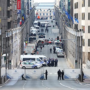 A security perimeter fence stands on Wetstraat as police and security forces gather outside Maelbeek metro station following a bomb attack in Brussels, Belgium, on Tuesday, March 22, 2016. Explosions ripped through the Brussels airport departure hall and a downtown subway station on Tuesday morning, causing deaths and injuries and spurring fears of imminent follow-up attacks in the capital of the European Union. Photographer: Jasper Juinen/Bloomberg via Getty Images