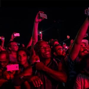 Fans cheer at the start of the Rolling Stones' free concert at the Ciudad Deportiva in Havana, March 25, 2016. Coming days after President Obama's historic visit there, the Stones were expected to draw 400,000 or more for their first show in Cuba -- or for that matter, anywhere in the Caribbean. (Mauricio Lima/The New York Times/Redux)