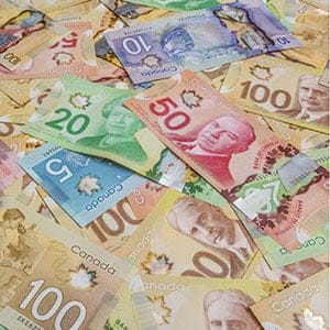 Canadian dollar bills. (Stuart Dee/Getty Images)