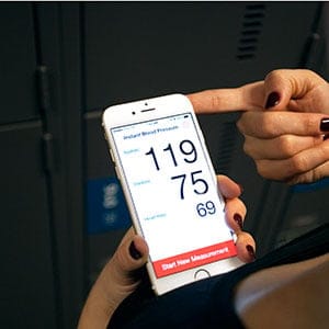 Photo of instant blood pressure app in in use. Photograph by Natalie Castellino.