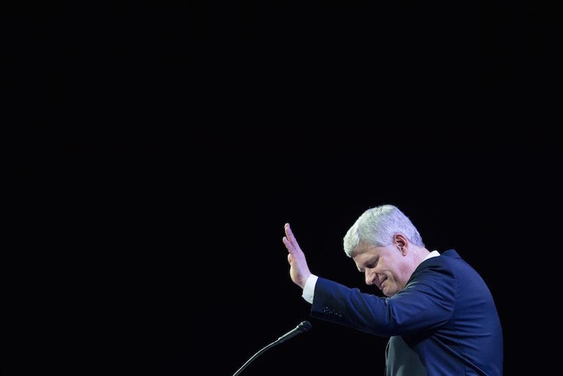 Former prime minister Stephen Harper waves as he steps away from the podium after addressing delegates during the 2016 Conservative Party Convention in Vancouver, B.C. on Thursday May 26, 2016. THE CANADIAN PRESS/Darryl Dyck