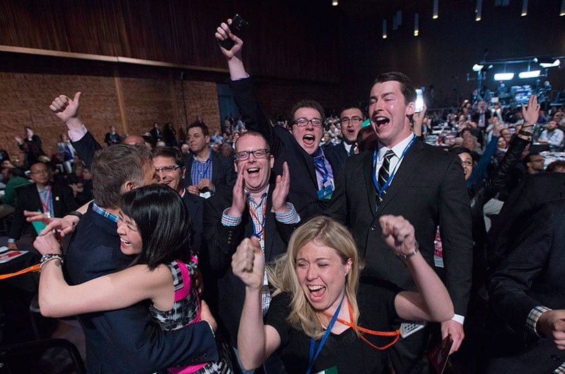 Delegates Michelle Rebel and Natalie Pon celebrate the yes vote to change the wording of the traditional definition of marriage in the conservative policies at the Conservative Party of Canada convention in Vancouver, Saturday, May 28, 2016. THE CANADIAN PRESS/Jonathan Hayward
