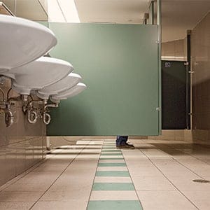 Man in a public washroom. (Photograph by Natalie Castellino)