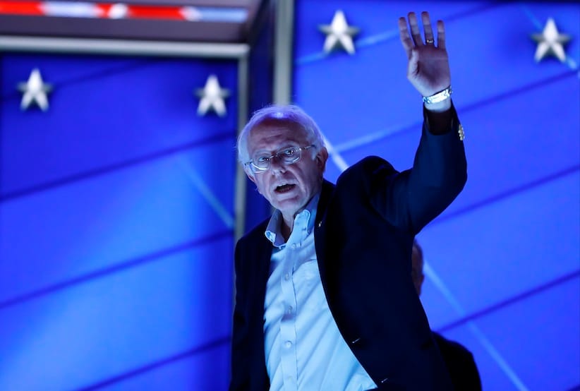 Sen. Bernie Sanders, I-Vt., waves as he walks off the stage after checking out the podium before the start of the first day of the Democratic National Convention in Philadelphia, Monday, July 25, 2016. (AP Photo/Carolyn Kaster)