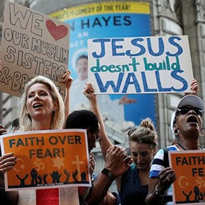 A group of interfaith religious leaders protest against Republican U.S. presidential candidate Donald Trump outside a hotel where he was to meet with evangelical leaders in New York City, U.S., June 21, 2016. (Brendan McDermid/Reuters)