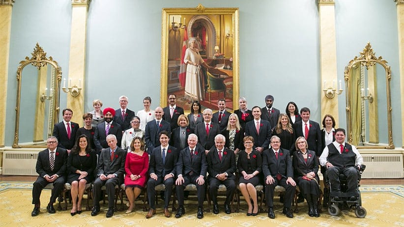 Newly elected Canadian Prime Minister Justin Trudeau, fifth left first row, takes a group photo with his cabinet ministers at Rideau Hall in Ottawa, Canada, Nov. 4, 2015. Justin Trudeau was sworn in as Canada's 23rd prime minister and named a 31-member cabinet here Wednesday. (Chris Roussakis/Xinhua News Agency/Getty Images)