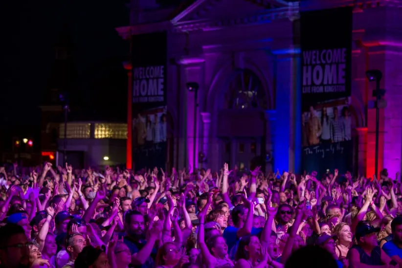 Tragically Hip fans watch the final concert in downtown Kingston. (Photograph by Nick Iwanyshyn)
