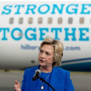 Democratic presidential candidate Hillary Clinton speaks to members of the media before boarding her campaign plane at Westchester County Airport. (Andrew Harnik/AP)