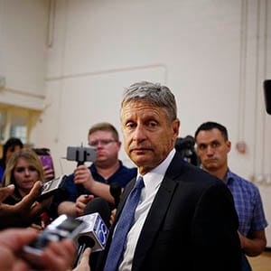 Gary Johnson, 2016 Libertarian presidential nominee, center, speaks with reporters following a campaign event at Purdue University in West Lafayette, Indiana, U.S., on Tuesday, Sept. 13, 2016. Johnson said he was "incredibly frustrated" with himself after failing to recognize the name of the Syrian city of Aleppo in a TV interview last week. (Luke Sharrett/Bloomberg/Getty Images)