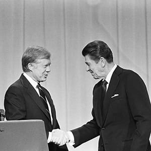 President Jimmy Carter and his Republican challenger, Ronald Reagan, shake hands as they greet one another before their debate on the stage of the Music Hall in Cleveland, Ohio, 1980. (Bettmann/Getty Images)