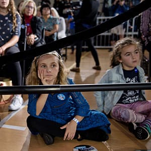 People listen as Democratic presidential nominee Hillary Clinton during a town hall meeting October 4, 2016 in Haverford, Pennsylvania. (Brendan Smialowski/AFP/Getty Images)