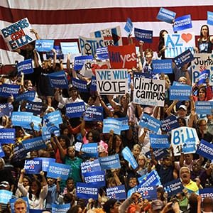 The audience listens as First Lady Michelle Obama speaks to a crowd of supporters as she campaigns for the Democratic Party presidential nominee Hillary Clinton at the Convention Center, in Phoenix, Arizona on October 20, 2016. (Mark Ralston/AFP/Getty Images)