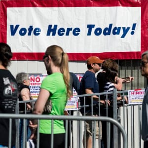 Voters line up at a temporary voting location in a trailer in the Arroyo Market Square shopping center in Las Vegas. (Bill Clark/CQ Roll Call/Getty Images)