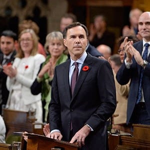 Finance Minister Bill Morneau receives applause as he delivers the government's fall economic update in the House of Commons on Parliament Hill in Ottawa on Tuesday, November 1, 2016. (Adrian Wyld/CP)