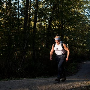 Professor Andrew Rawicz hung up his car keys in 2002 and since then makes the 5 km trek to work and back every day with more than 30,000 km under his belt. He's now less than a year away from walking the entire circumference of the earth. (Photograph by Jimmy Jeong)