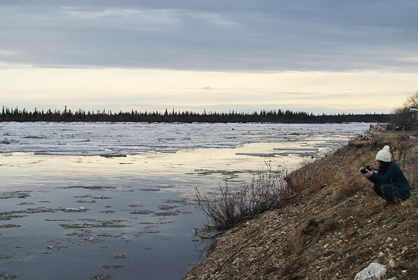 Yukon College art student studying climate change