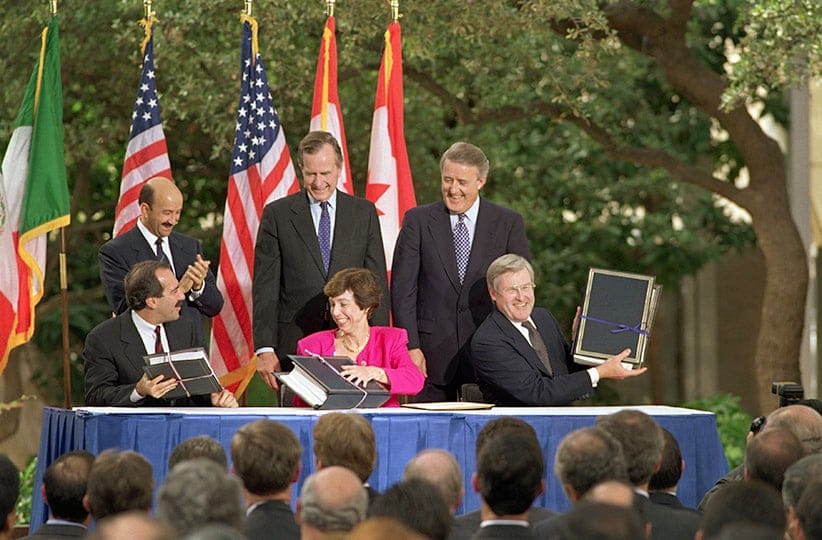 The North American Free Trade Agreement was initialed in San Antonio 10/7, with President Bush (C) Mexican President Carlos Salinas de Gortari (L) and Canadian Prime Minister Brian Mulroney (R) in attendance. Chief trade representatives Julie Puche (L) of Mexico, Carla Hills (C) of USA and Michael Wilson (R) of Canada were also there. (Bettmann/Getty Images)