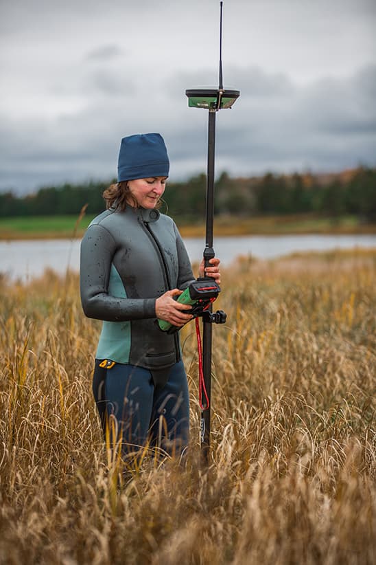 Nova Scotia Community College Research associate Kate Collins gathers GPS data