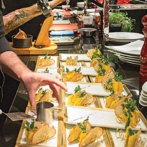 Chef Eric Gonzalez is seen preparing the "Salmon Tartare with Caviar" dish at the Restaurant L'Atelier de Joël Robuchon on Saturday, February 25, 2017, at the Montreal Casino, in Montreal, Quebec. (Photograph by Giovanni Capriotti)