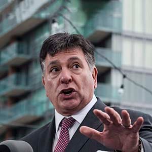 Ontario Finance Minister Charles Sousa speaks about Ontario's Fair Housing Plan during a press conference in Toronto on Thursday, April 20, 2017. (Christopher Katsarov/CP)