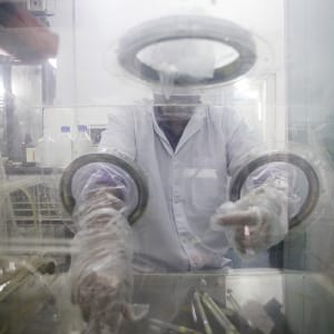 A research assistant prepares syringes inside a pharmacy glovebox at the reversible inhibition of sperm under guidance (RISUG) male contraceptive treatment research and development laboratory at Indian Institute of Technology (IIT) Kharagpur in Kharagpur, West Bengal, India, on Feb. 16, 2017. A new birth control method for men has the potential to win as much as half the $10 billion market for female contraceptives worldwide and cut into the $3.2 billion of annual condom sales, businesses dominated by pharmaceutical giants Bayer AG, Pfizer Inc. and Merck & Co., according to estimates from the last major drug company to explore the area. (Sumit Dayal/Bloomberg/Getty Images)