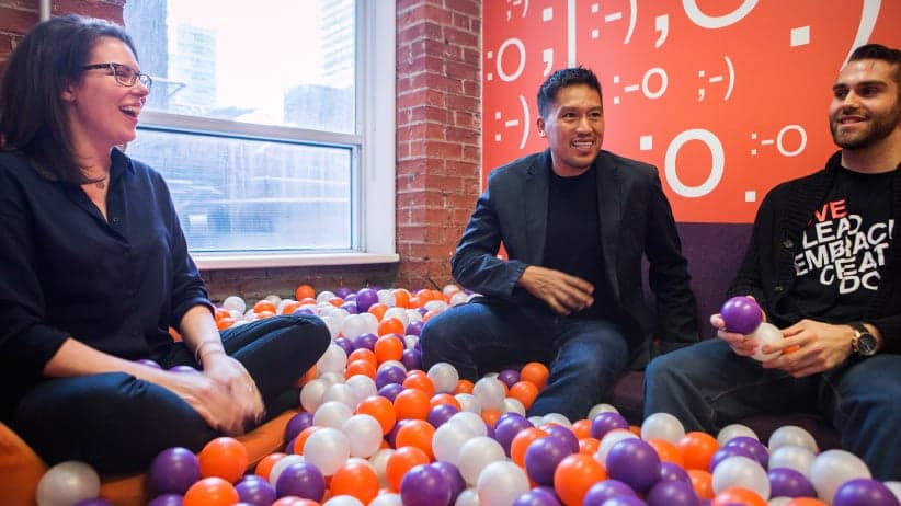 Bruce Poon Tip, Amanda Dunning and Stephan Popescu at the G Adventures’ Toronto office