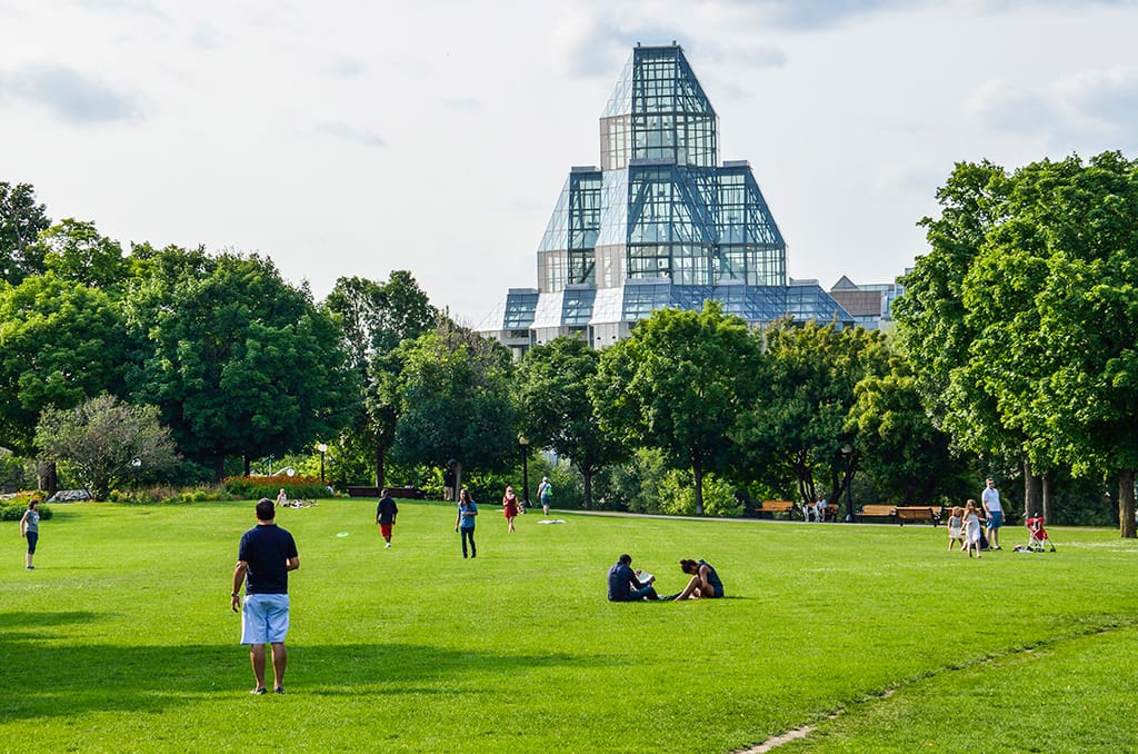 Ottawa, Canada - July 24, 2014: People in Majors Hill Park by National Gallery museum (ablokhin/iStock)