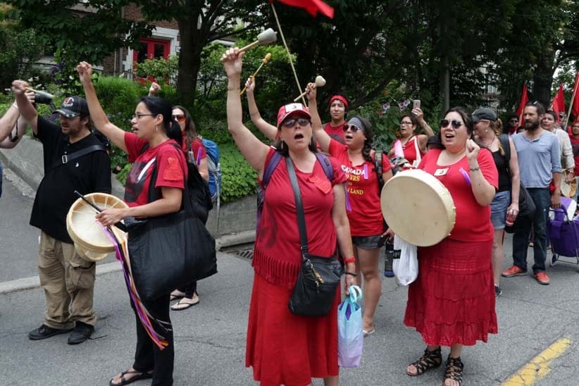 Indigenous activists protest at Carolyn Bennett's Canada Day BBQ. (Photograph by Kris Hessey)