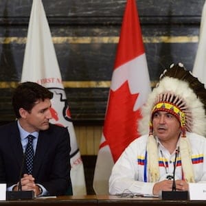 Prime Minister Justin Trudeau and Assembly of First Nations Chief Perry Bellegarde participates in the signing of the Assembly of First Nations-Canada Memorandum of Understandingon Joint Priorities on Parliament Hill in Ottawa on Monday, June 12, 2017. THE CANADIAN PRESS/Sean Kilpatrick