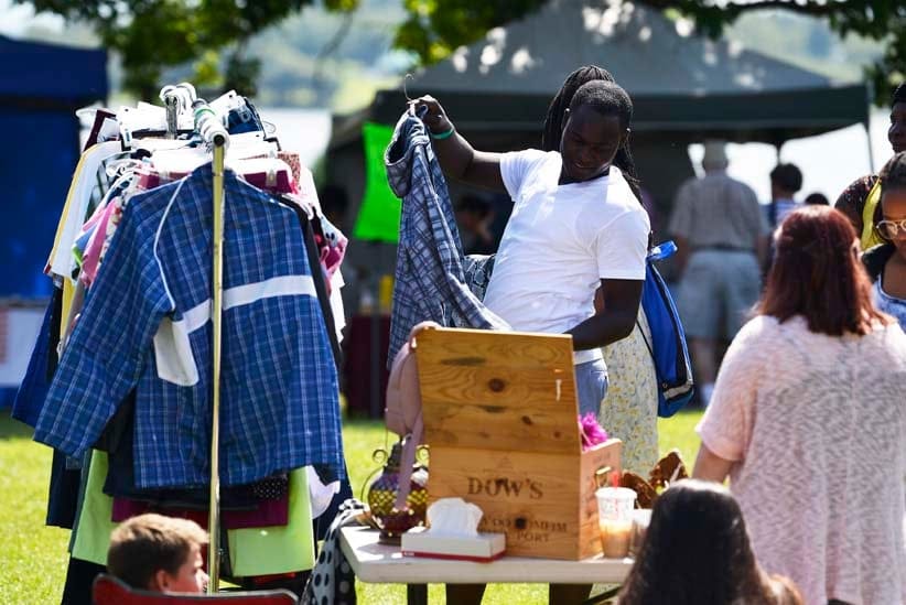 Haitian asylum seekers coming from the United States take part in the Garlic Festival at the NAV Centre in Cornwall, Ont., on Sunday, August 27, 2017. Macleans/Matthew Usherwood