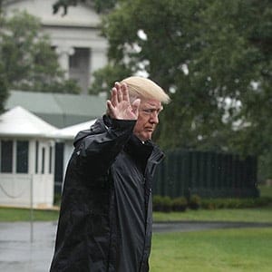 WASHINGTON, DC - AUGUST 29: U.S. President Donald Trump walks with first lady Melania Trump prior to their Marine One departure from the White House August 29, 2017 in Washington, DC. President Trump was traveling to Texas to observe the Hurricane Harvey relief efforts. (Photo by Alex Wong/Getty Images)