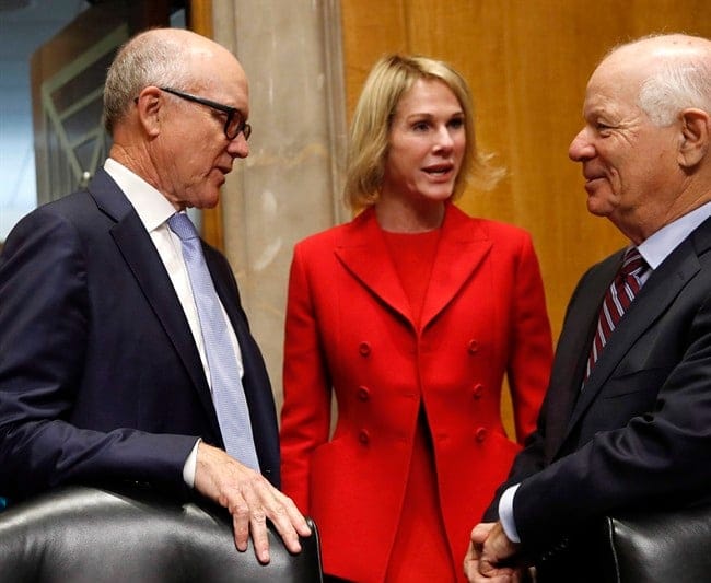 Woody Johnson, owner of the New York Jets, who is nominated to be Ambassador to the United Kingdom, speaks with Kelly Knight Craft, who is nominated to be Ambassador to Canada, and Sen. Ben Cardin, D-Md., at the start of a a Senate Foreign Relations Committee hearing on their nominations, Thursday, July 20, 2017, on Capitol Hill in Washington. Donald Trump's ambassador is heading to Canada: the United States Senate has swiftly confirmed Kelly Knight Craft, endorsing her nomination in time for her to begin work as major trade negotiations start. THE CANADIAN PRESS/AP, Jacquelyn Martin