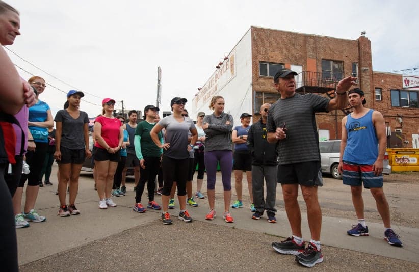 The Running Room president and founder John Stanton sets up a drill for a running group in Edmonton