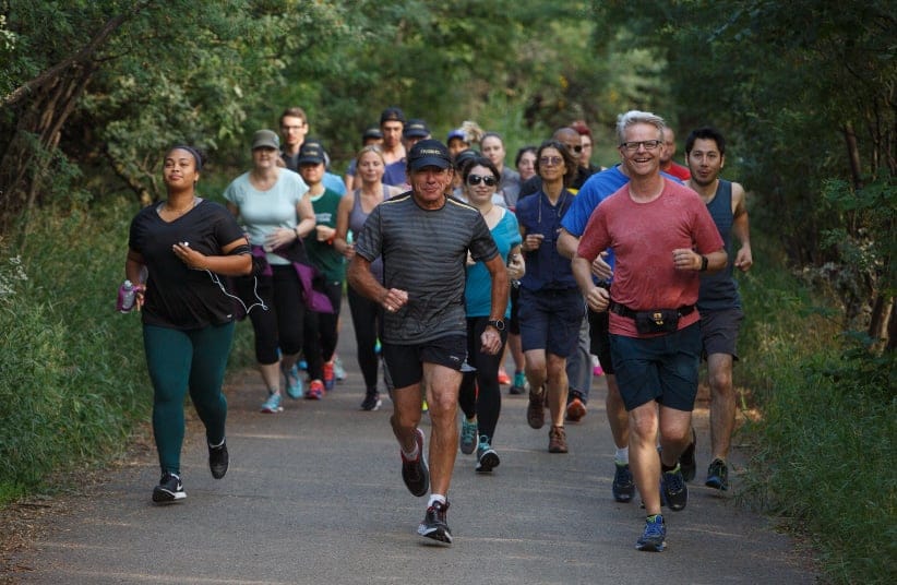 The Running Room president and founder John Stanton runs with one of the many running groups in Edmonton, Alberta on Sunday, July 30, 2017. Amber Bracken for Maclean's