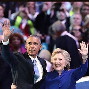 PHILADELPHIA, PA - JULY 27: US President Barack Obama and Democratic presidential nominee Hillary Clinton acknowledge the crowd on the third day of the Democratic National Convention at the Wells Fargo Center, July 27, 2016 in Philadelphia, Pennsylvania. Democratic presidential candidate Hillary Clinton received the number of votes needed to secure the party's nomination. An estimated 50,000 people are expected in Philadelphia, including hundreds of protesters and members of the media. The four-day Democratic National Convention kicked off July 25. (Drew Angerer/Getty Images)
