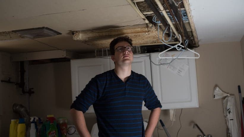 Student housing: Jeremy Biro, a third year biology student at McMaster University, stands in the basement of his house in Hamilton, On. Siro has issues with how his landlord neglects his house and the living conditions he is in. (Photograph, Hannah Yoon)