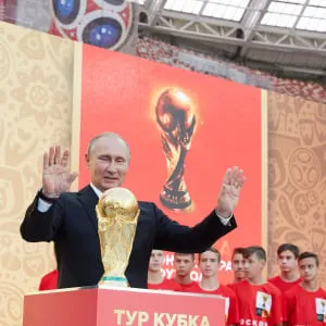 FIFA President Gianni Infantino and President of Russian Federation Vladimir Putin stay on the stage with a Trophy during FIFA World Cup Trophy Tour at Luzhniki stadium on September 9, 2017 in Moscow, Russia. (Oleg Nikishin/FIFA/Getty Images)