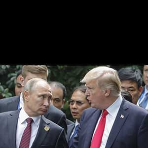 DA NANG, VIETNAM - NOVEMBER 11, 2017: Russia's president Vladimir Putin (L) and US president Donald Trump during a photo session of world leaders on the closing day of the 25th APEC Summit. Mikhail Metzel/TASS (Photo by Mikhail MetzelTASS via Getty Images)
