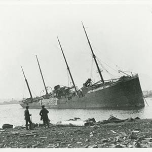 Norwegian steamship Imo beached on Dartmouth shore after the explosion, 1918. (Nova Scotia Archives)