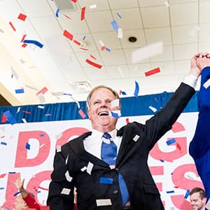 UNITED STATES - DECEMBER 12: Alabama Democrat Doug Jones celebrates his victory over Judge Roy Moore at the Sheraton in Birmingham, Ala., on Tuesday, Dec. 12, 2017. Jones faced off against Judge Roy Moore in a special election for Jeff Sessions' seat in the U.S. Senate. (Photo By Bill Clark/CQ Roll Call)