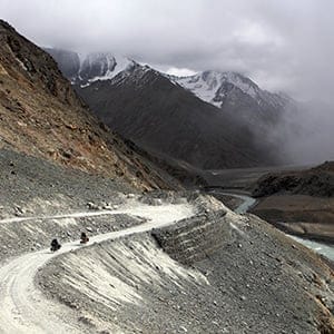 Author Kate Harris and her friend Mel Yule cycling through Ladakh. (Kate Harris)
