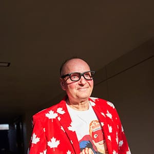 High school teacher Dave Dsuchanek, also known as "flag man," poses for a portrait after teaching a class of grade twelve students at Appleby College in Oakville, Ont., on January 26, 2018. The 58-year-old has taken on various missions including fighting to rewrite a slogan on the Canadian Coat of Arms and ordering $400 worth of Canadian flags to stock his car so he can replace flags himself. (Michelle Siu for Maclean's)