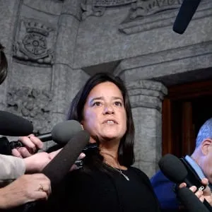 Minister of Justice and Attorney General of Canada Jody Wilson-Raybould speaks to reporters in the Foyer of the House of Commons on Parliament Hill in Ottawa on Monday, Feb. 12, 2018. (Justin Tang/CP)