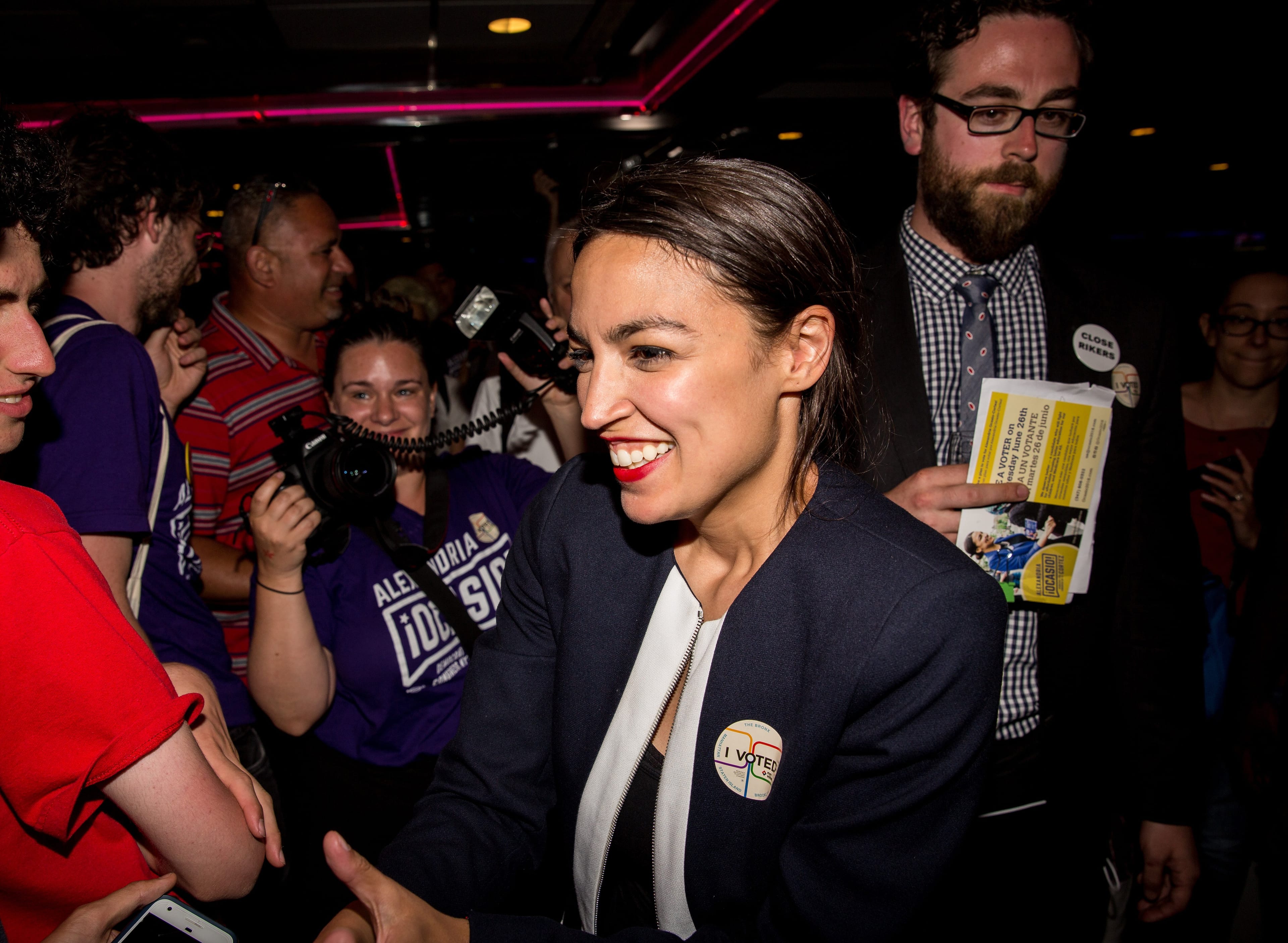 Progressive challenger Alexandria Ocasio-Cortez celebrartes with supporters at a victory party in the Bronx after upsetting incumbent Democratic Representative Joseph Crowly on June 26, 2018 in New York City. Ocasio-Cortez upset Rep. Joseph Crowley in New York’s 14th Congressional District, which includes parts of the Bronx and Queens. (Scott Heins/Getty Images)
