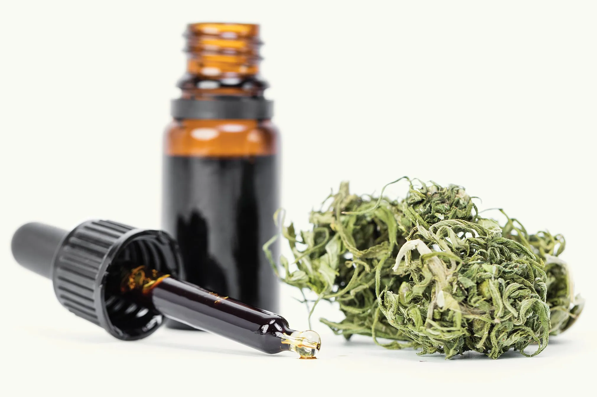 Marijuana and tincture (J. Lekavicius/Shutterstock)